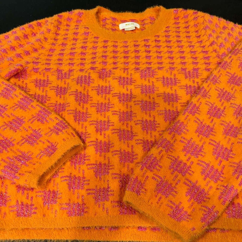Great sweater- boxy and super fun.